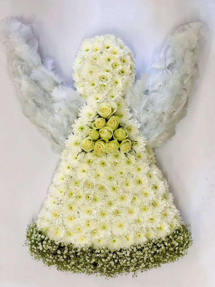 <h2>Angel Tribute | Funeral Flowers</h2>
<ul>
<li>Approximate Size 70cm x 50cm</li>
<li>Hand created white Angel in fresh flowers and foliages</li>
<li>To give you the best we may occasionally need to make substitutes</li>
<li>Funeral Flowers will be delivered at least 2 hours before the funeral</li>
<li>For delivery area coverage see below</li>
</ul>
<br>
<h2>Liverpool Flower Delivery</h2>
<p>We have a wide selection of Bespoke Funeral Tributes offered for Liverpool Flower Delivery. Bespoke Funeral Tributes can be provided for you in Liverpool, Merseyside and we can organize Funeral flower deliveries for you nationwide. Funeral Flowers can be delivered to the Funeral directors or a house address. They can not be delivered to the crematorium or the church.</p>
<br>
<h2>Flower Delivery Coverage</h2>
<p>Our shop delivers funeral flowers to the following Liverpool postcodes L1 L2 L3 L4 L5 L6 L7 L8 L11 L12 L13 L14 L15 L16 L17 L18 L19 L24 L25 L26 L27 L36 L70 If your order is for an area outside of these we can organise delivery for you through our network of florists. We will ask them to make as close as possible to the image but because of the difference in stock and sundry items it may not be exact.</p>
<br>
<h2>Liverpool Funeral Flowers | Bespoke Tributes</h2>
<p>This bespoke Angel Funeral Tribute has been loving handcrafted by our expert florists and comes complete with wings made from white feathers to create the delicate wing shapes.</p>
<br>
<p>Bespoke Funeral Tributes are a way to create a tribute that is truly unique and specially designed for a loved one.</p>
<br>
<p>These are sometimes selected by family members as the main tribute or more often a group of friends or workplace colleagues as a symbol of things they associate with the deceased.</p>
<br>
<p>The flowers are arranged in floral foam, which means the flowers have a water source so they look their very best for the day.</p>
<br>
<p>Containing 7 gypsophila, 1 pink rose, 10 pink spray chrysanthemums, white ageratum, white feathers, white skeleton leaves and decorated with silver and white bullion wire.</p>
<br>
<h2>Best Florist in Liverpool</h2>
<p>Trust Award-winning Liverpool Florist, Booker Flowers and Gifts, to deliver funeral flowers fitting for the occasion delivered in Liverpool, Merseyside and beyond. Our funeral flowers are handcrafted by our team of professional fully qualified who not only lovingly hand make our designs but hand-deliver them, ensuring all our customers are delighted with their flowers. Booker Flowers and Gifts your local Liverpool Flower shop.</p>
<br>
<p><em>Debera G - 5 Star Review on yell.com - Funeral Florist Liverpool</em></p>
<br>
<p><em>Fleur and her team made the flowers for my Dad's funeral. I knew I wanted something quite specific but was quite unsure how to execute the idea. Fleur understood immediately what I was hoping to achieve and developed the ideas into amazingly beautiful flowers that were just perfect. I honestly can't recommend her highly enough - she created something outstanding and unique for my Dad. Thanks Fleur.</em></p>